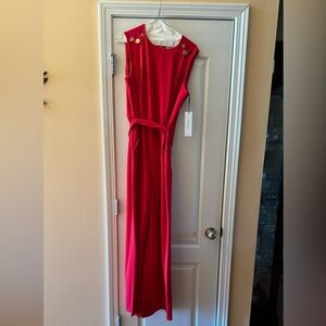 Beautiful, classy Jump Suit never worn! Great for a holiday party. Inseam 28